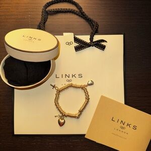 Links of London Sweetie bracelet with 3 charms. With box, bag and receipt!